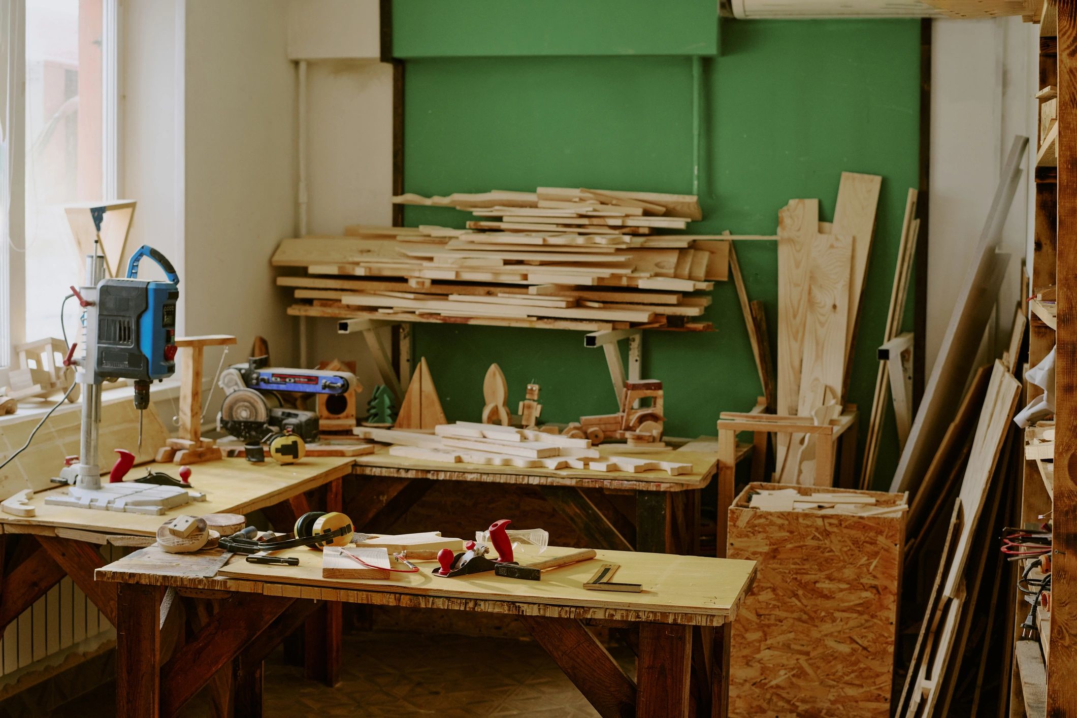 Woodworking workshop with tools and lumber