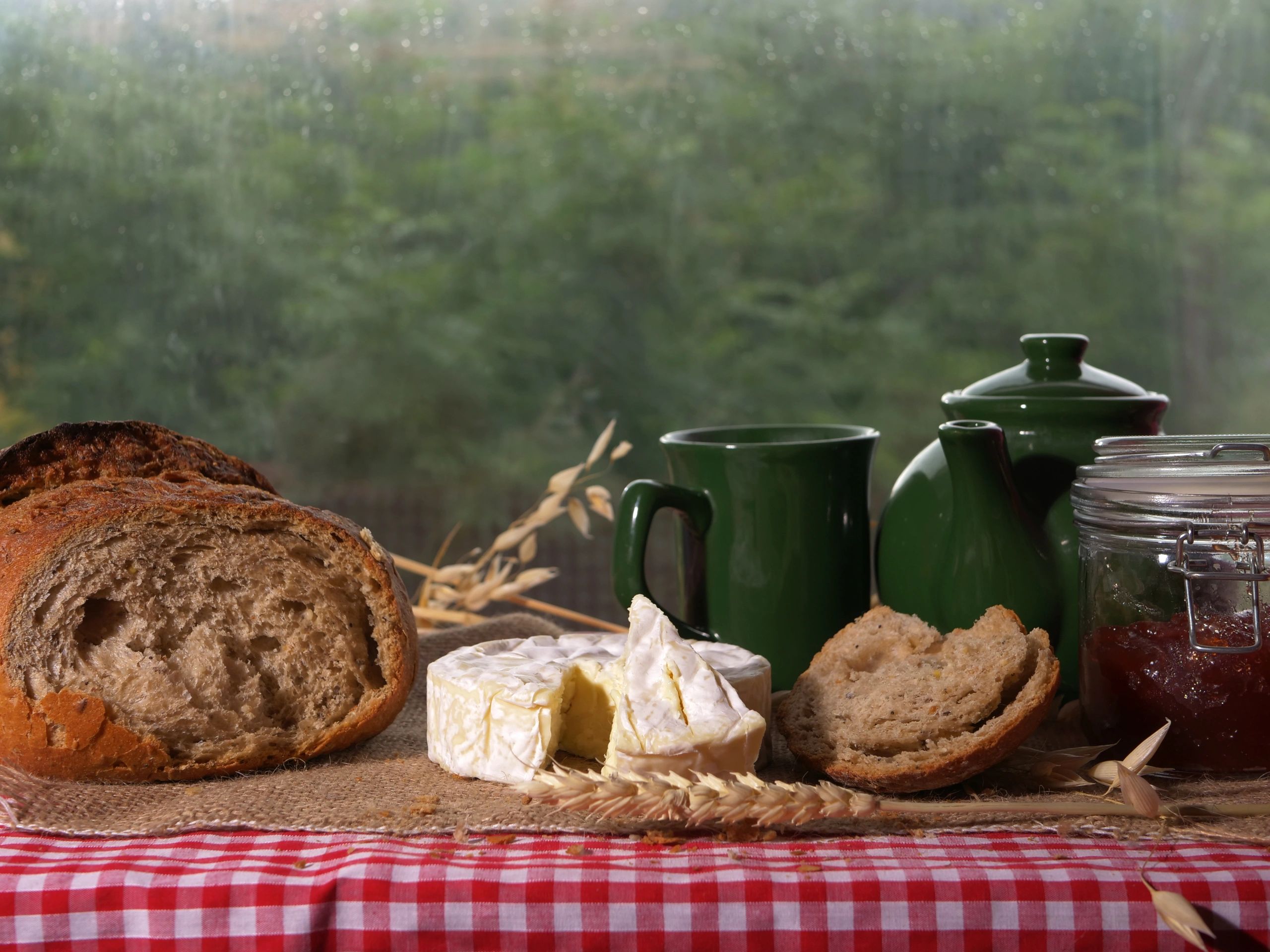 Tea with Camembert cheese and wholemeal loaf of bread